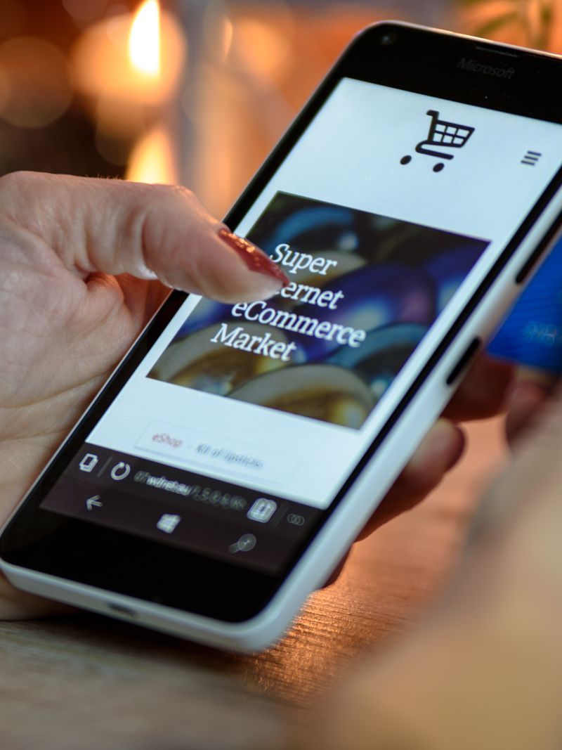 Online shopping on a laptop with a credit card